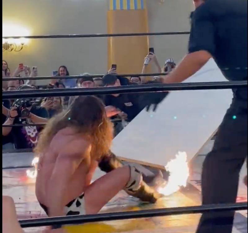 Joey Janela requires help after flaming superkick at GCW Maniac