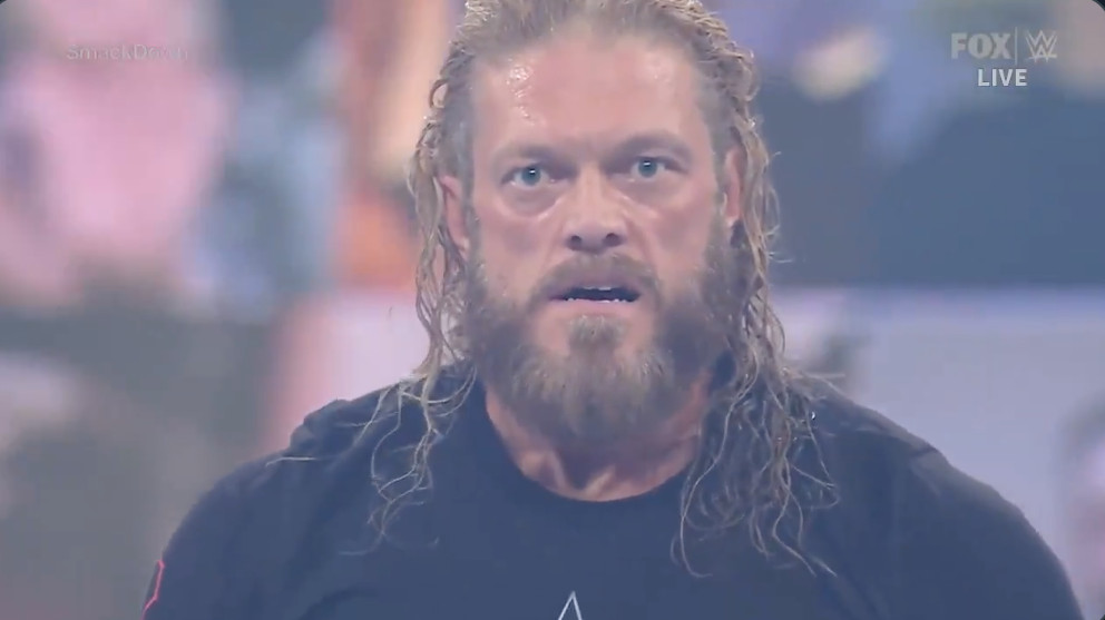 Edge returns to WWE SmackDown, brawls with Roman Reigns