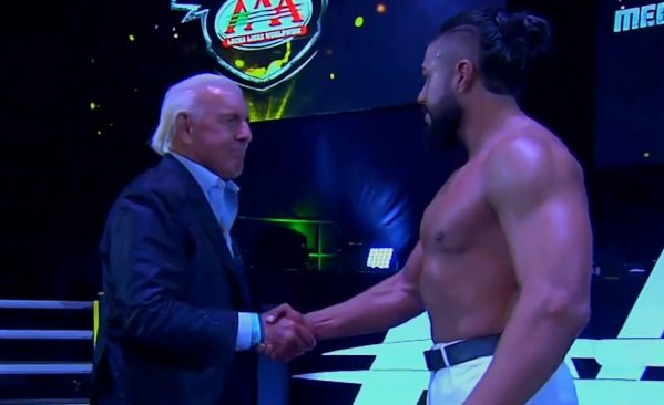 Ric Flair appears at AAA Triplemania XXIX, accompanies Andrade