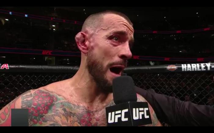 CM Punk gets submitted in UFC debut, vows to fight again
