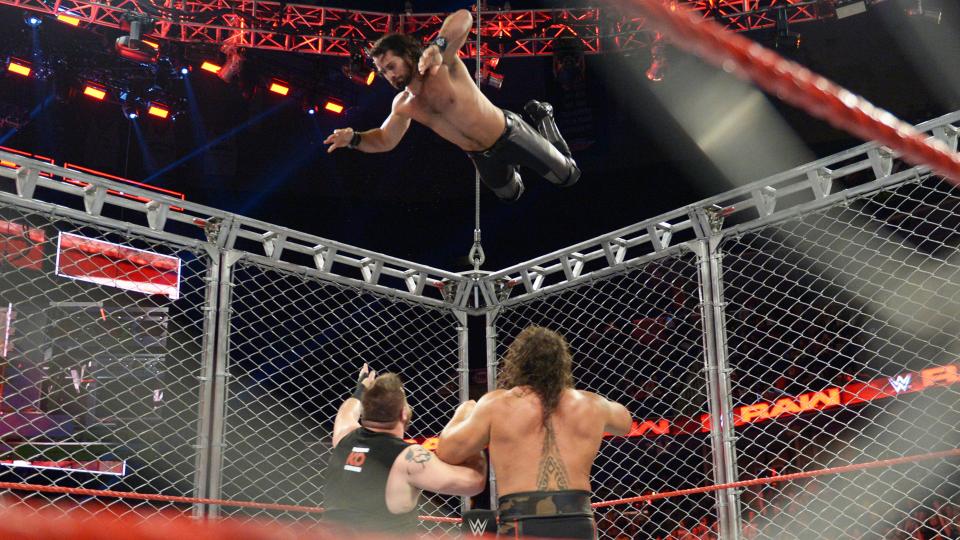 WWE Raw video highlights: Roman Reigns vs. Kevin Owens in a cage