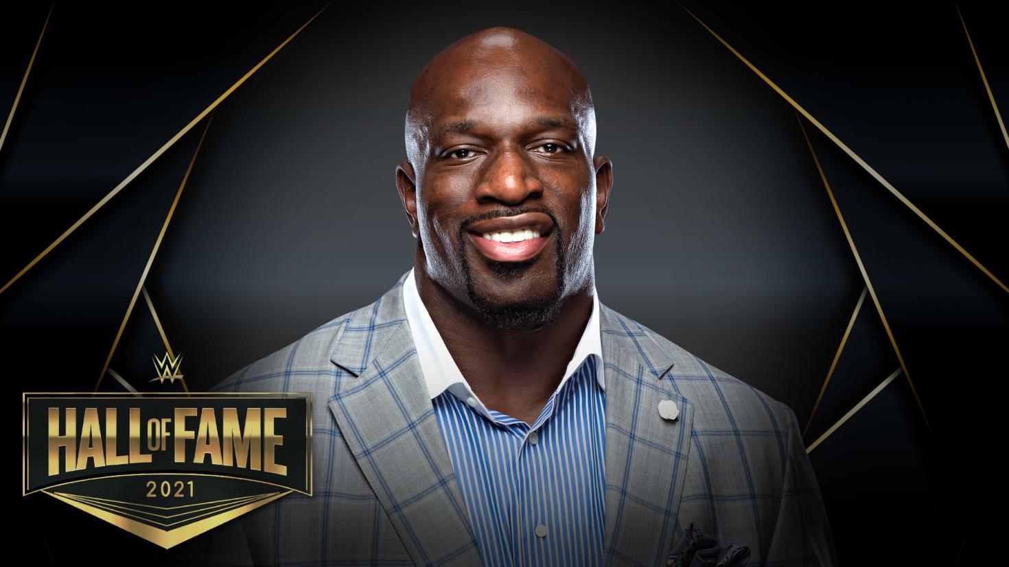 Titus O’Neil receiving Warrior Award at WWE Hall of Fame ceremony