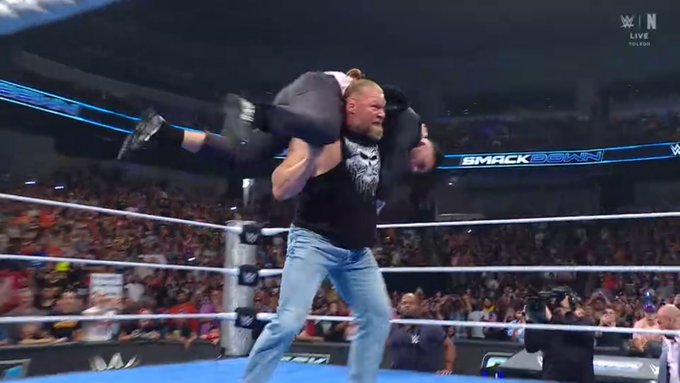 Brock Lesnar attacks WWE SmackDown commentary team