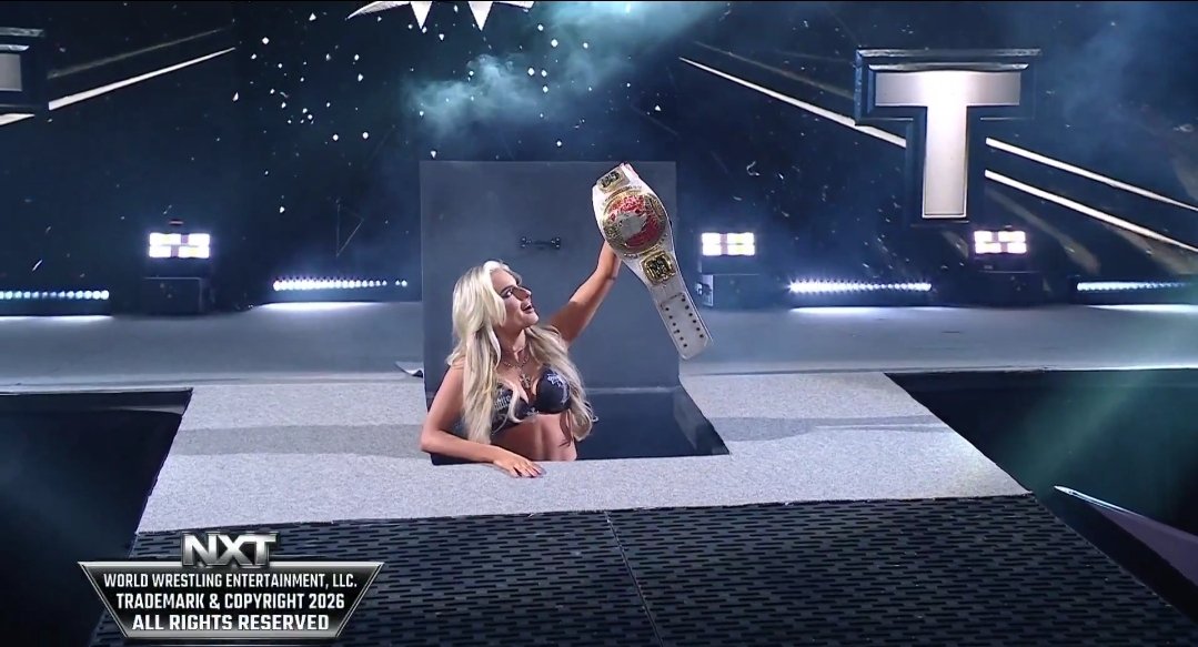 Blake Monroe poses with the NXT North American title