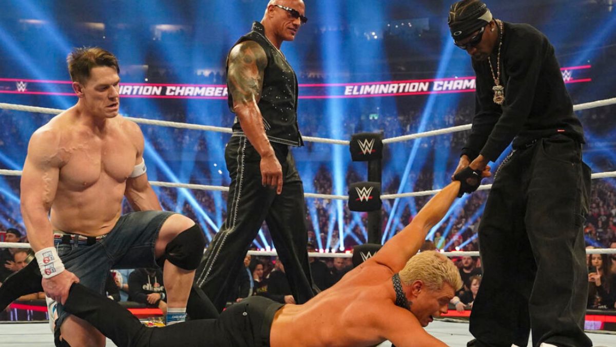 The Rock, John Cena and Travis Scott attacking Cody Rhodes at Elimination Chamber 2025